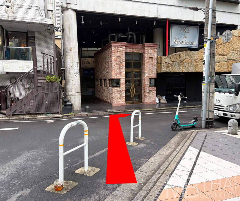 Cross the road, turn right, and continue.